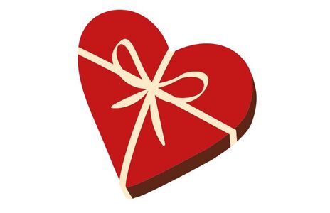 Rotes Herz mit einer Schleife, das wie ein Geschenk aussieht