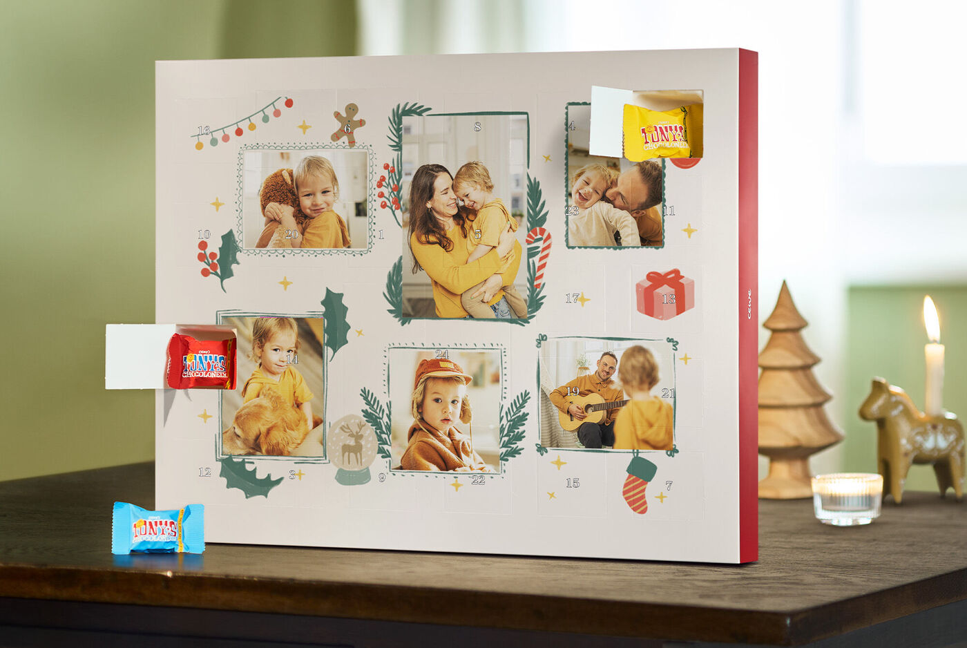 Bunt gestalteter Adventskalender mit persönlichen Fotos und süßen Überraschungen.